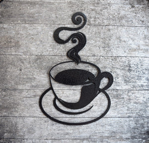 Enhance your decor with a hammered black painted steel cutout of a steaming coffee cup, adding sophistication and style to any space.