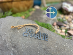 Load image into Gallery viewer, &quot;We Are Charlie&quot; tribute ornament with greenery, honoring conservative values.
