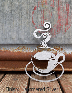 Stunning hammered silver painted steel coffee cup cutout, emitting an alluring steam effect, ideal for contemporary outdoor decor