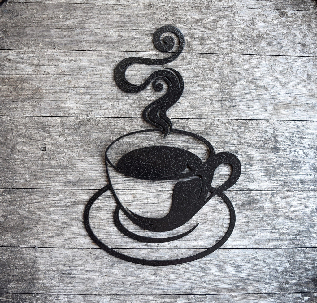 Discover artisanal craftsmanship in this hammered black painted steel coffee cup cutout, exuding rustic charm with its steamy allure. Elevate your decor with this unique and bold statement piece, perfect for adding warmth and character to any space.